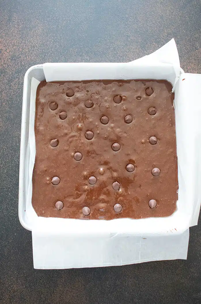 Pour batter in a greased pan