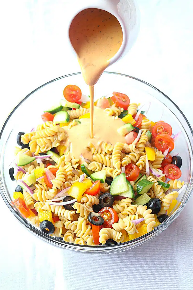Add  dressing to the salad