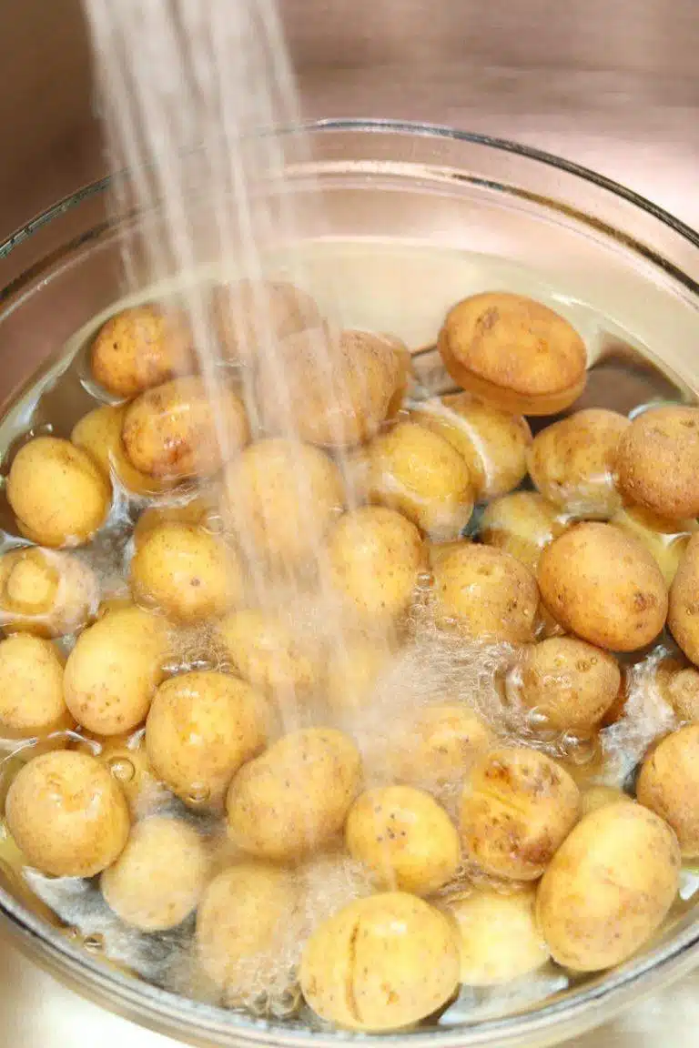 Oven Roasted Potatoes being washed