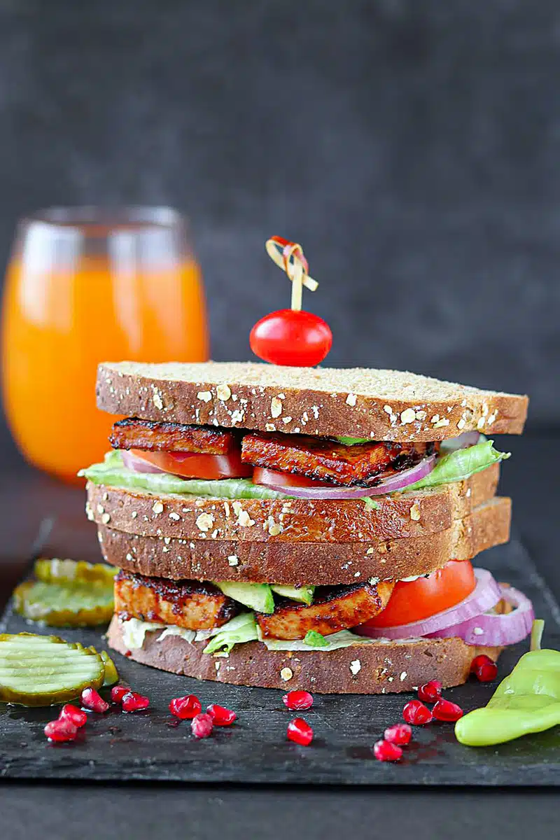 Vegan BBQ Tofu Sandwich served with pickles