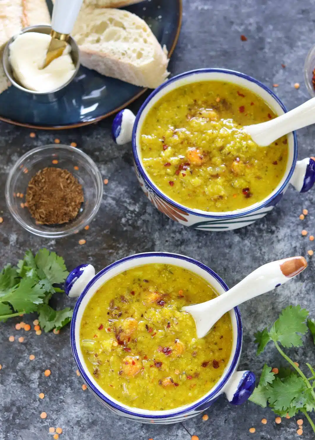 Instant Pot Broccoli Lentil Soup in a bowl with spoon