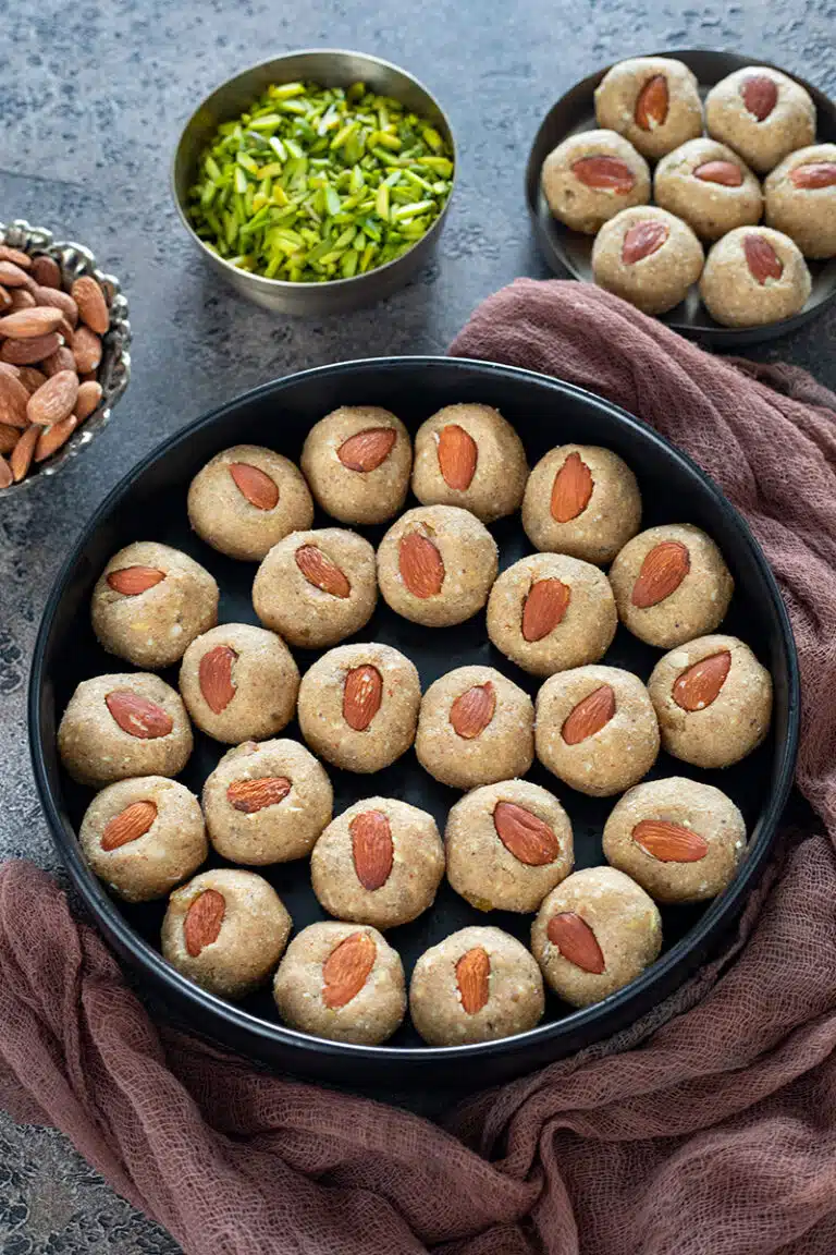 Aate ki Pinni arranged in a black plate