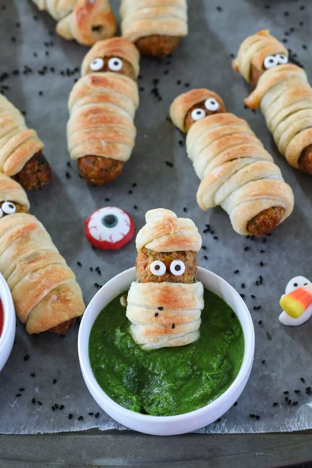 Croquettes resting in a chutney tub