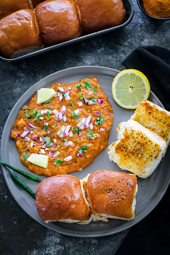 Bhaji on a plate with soft Ladi pavs