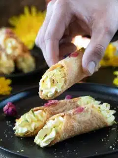 Stacked Baked Shahi Tukda Cannoli on a plate