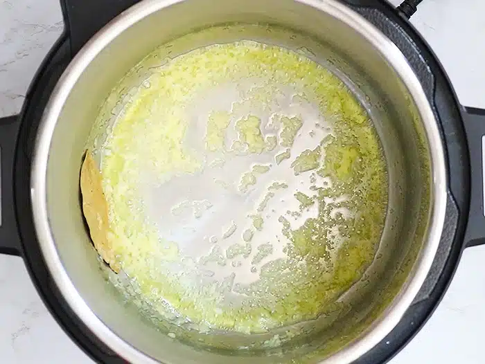 Cook garlic