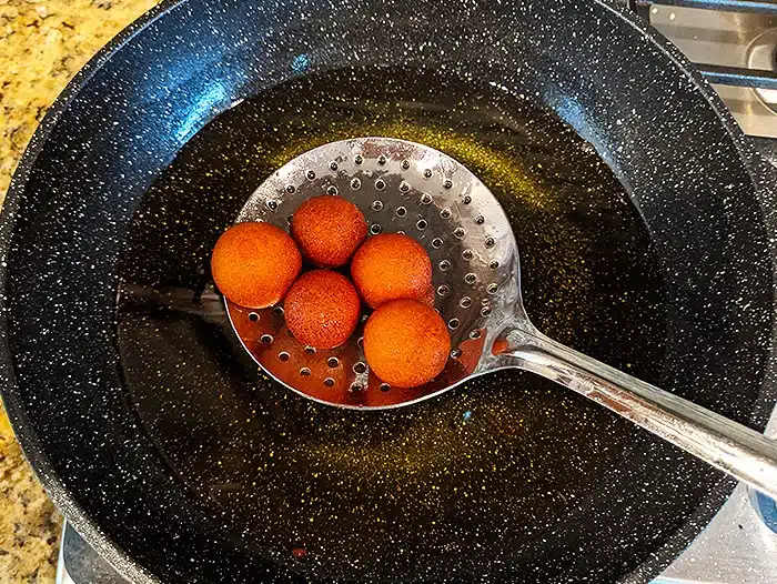 Remove Gulab Jamun from oil